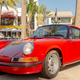 I love this 911. Not too flashy. Not too perfect, but yet perfectly perfect. The yellow lettering on the tires really ties the room together.